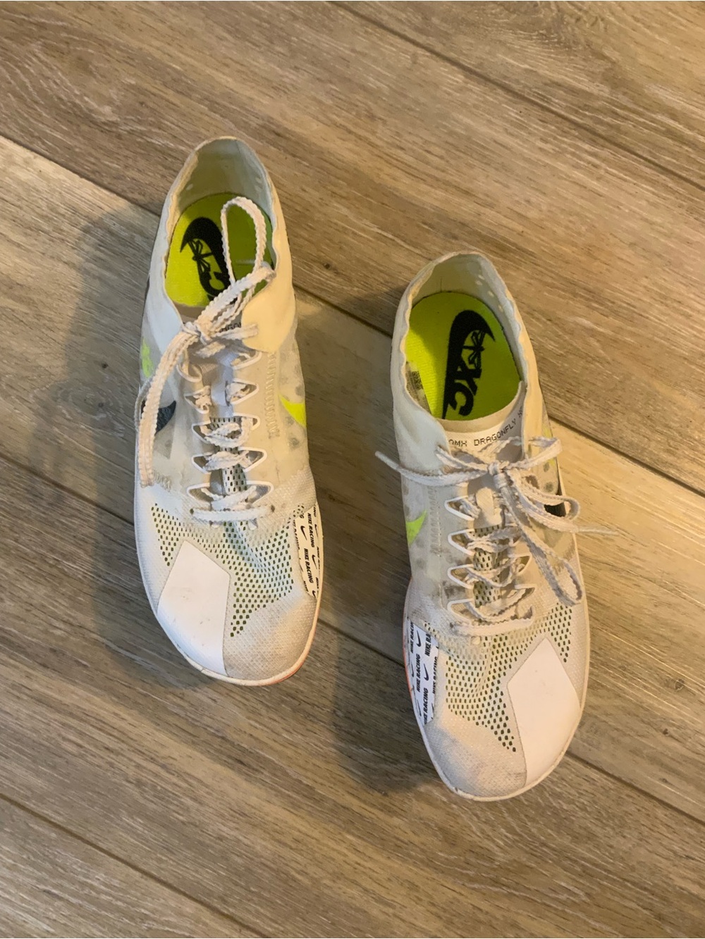Nike Women's White Athletic Sneakers with Neon Yellow Accents